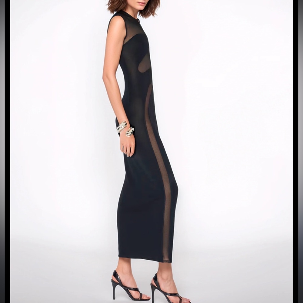 ALAÏA
Knit Molded Bodycon Dress